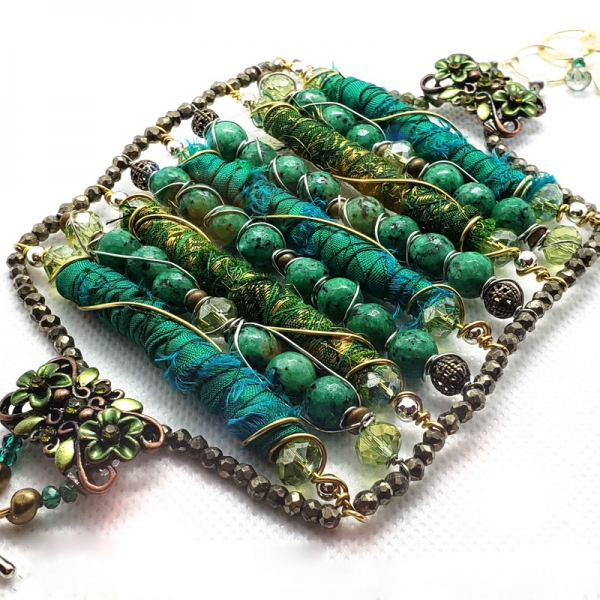 Manifestation of Magic and Miracles (Green Heart Chakra Bracelet with luxurious saree fabric and illuminating gemstones)